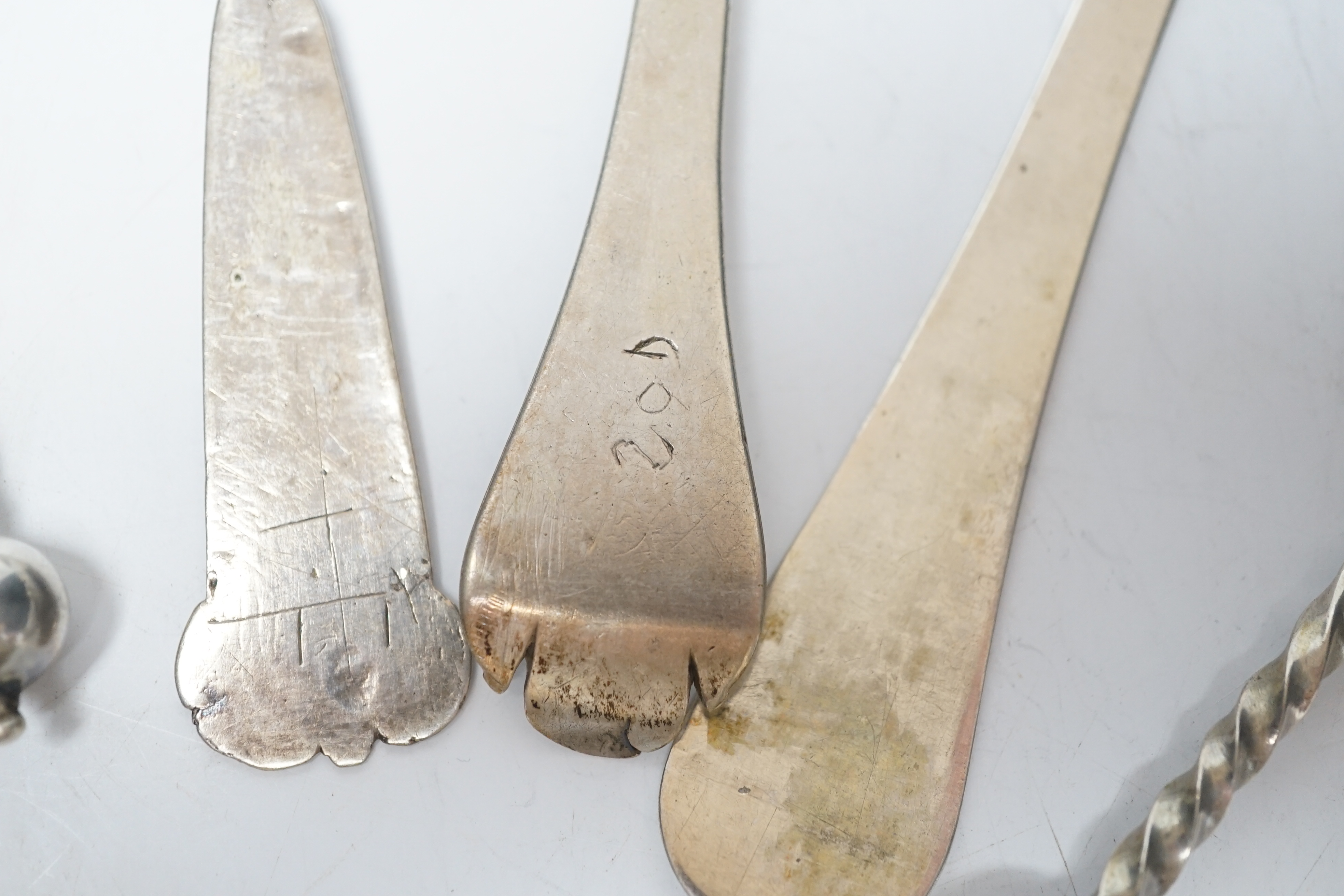 Five assorted 19th century and later Scandinavian? white metal spoons, two with maker's marks, largest 18cm.
